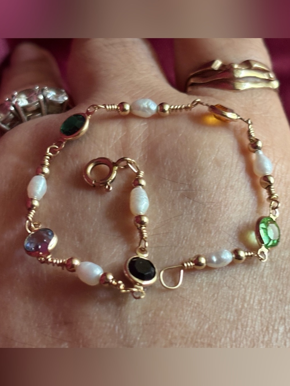 1/20/14 K.GF☘️bracelet has marked 🧡🖤💙🤍